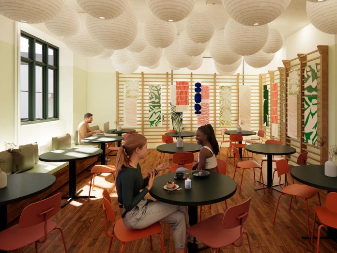 Visualisering af caféen i et lyst lokale med runde borde og ribber på væggen.